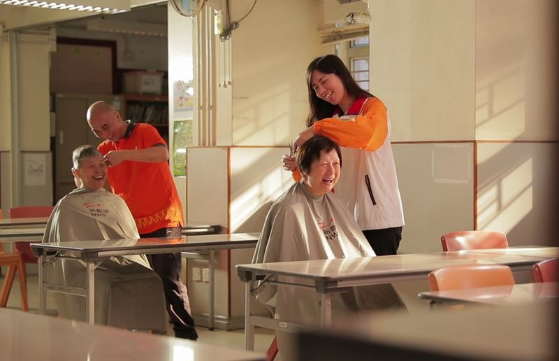 NWS Holdings and 10 member companies awarded Caring Company Logo